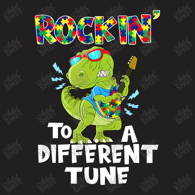 Rockin To A Different Tune Autism Awareness Dinosaur T-Shirt by LeiThompson | Artistshot