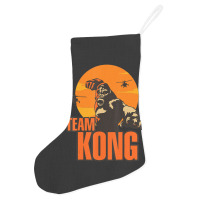 Team Kong Taking Over The City And Helicopters Sunset Holiday Stocking | Artistshot