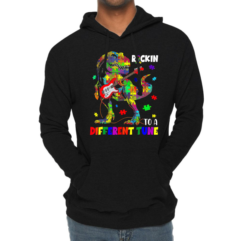 Rockin To A Different Tune Autism Awareness Trex Dinosaur Lightweight Hoodie by LeiThompson | Artistshot