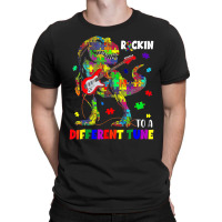 Rockin To A Different Tune Autism Awareness Trex Dinosaur T-shirt | Artistshot